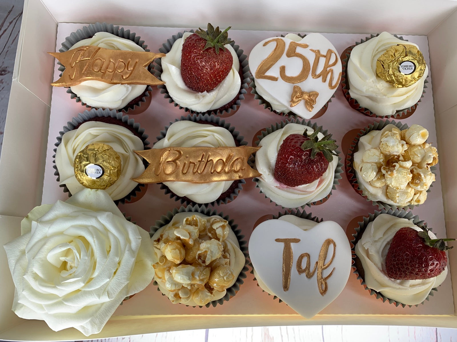 25th birthday cupcake gift box with strawberries and gold decorations