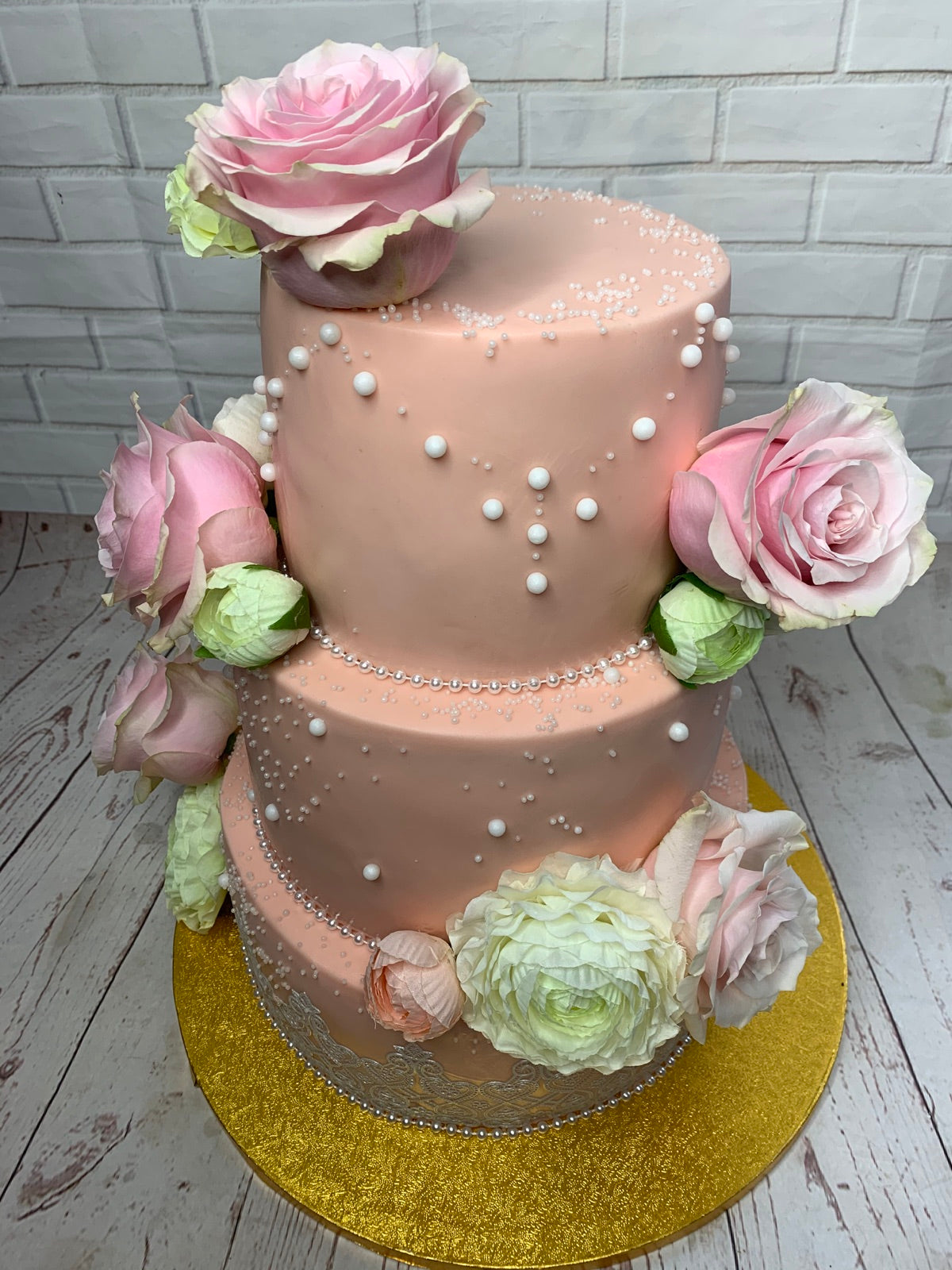 Blush floral tiered wedding cake