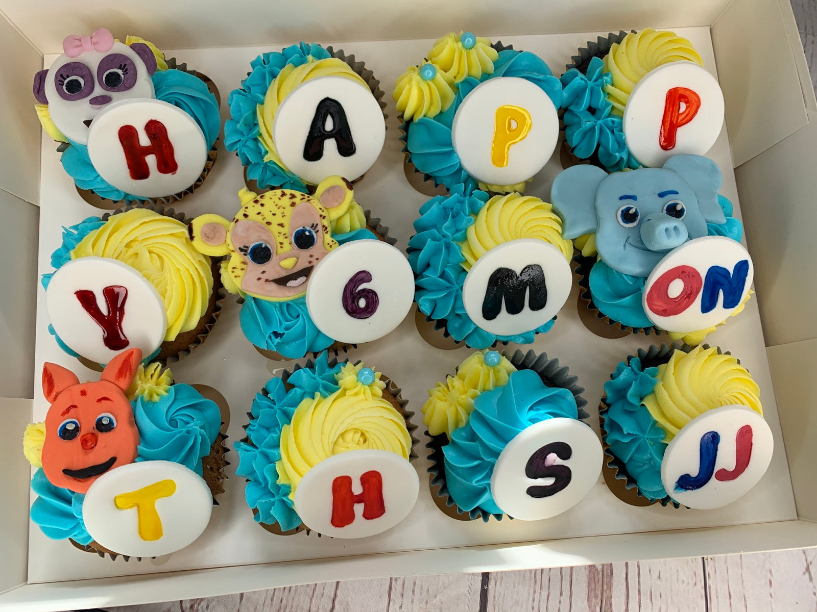 Decorated cupcake box by Dimple Boy Cupcakes