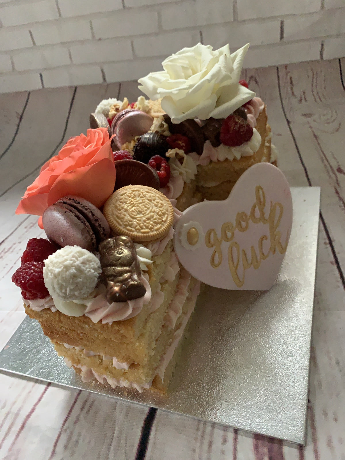 Custom celebration cake by Dimple Boy Cupcakes