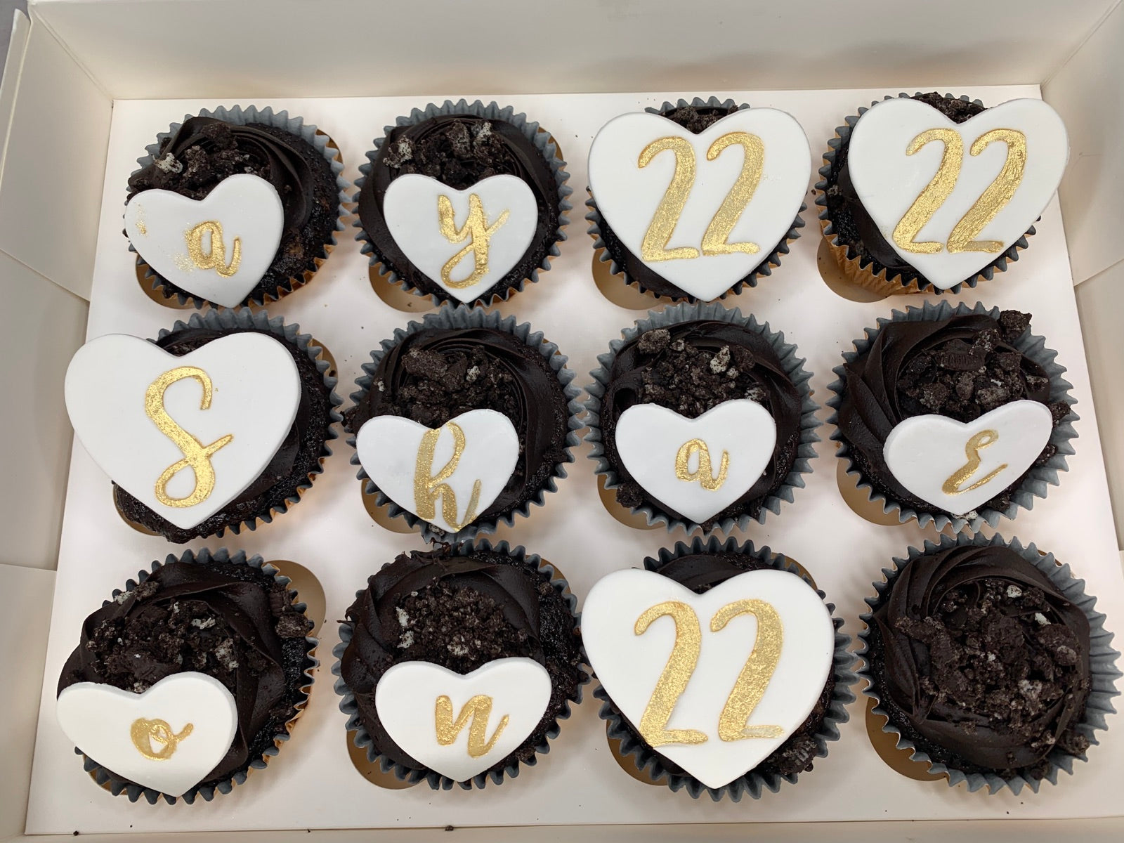 Decorated cupcake box by Dimple Boy Cupcakes