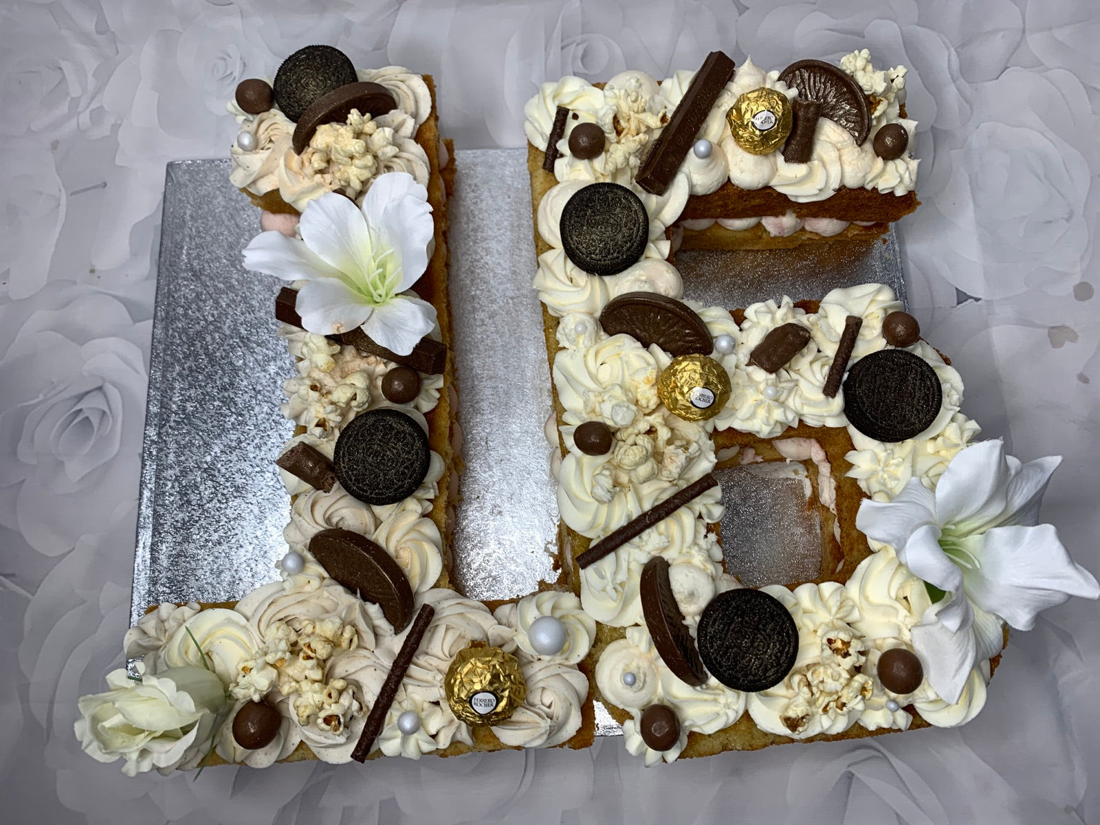 Custom celebration cake by Dimple Boy Cupcakes