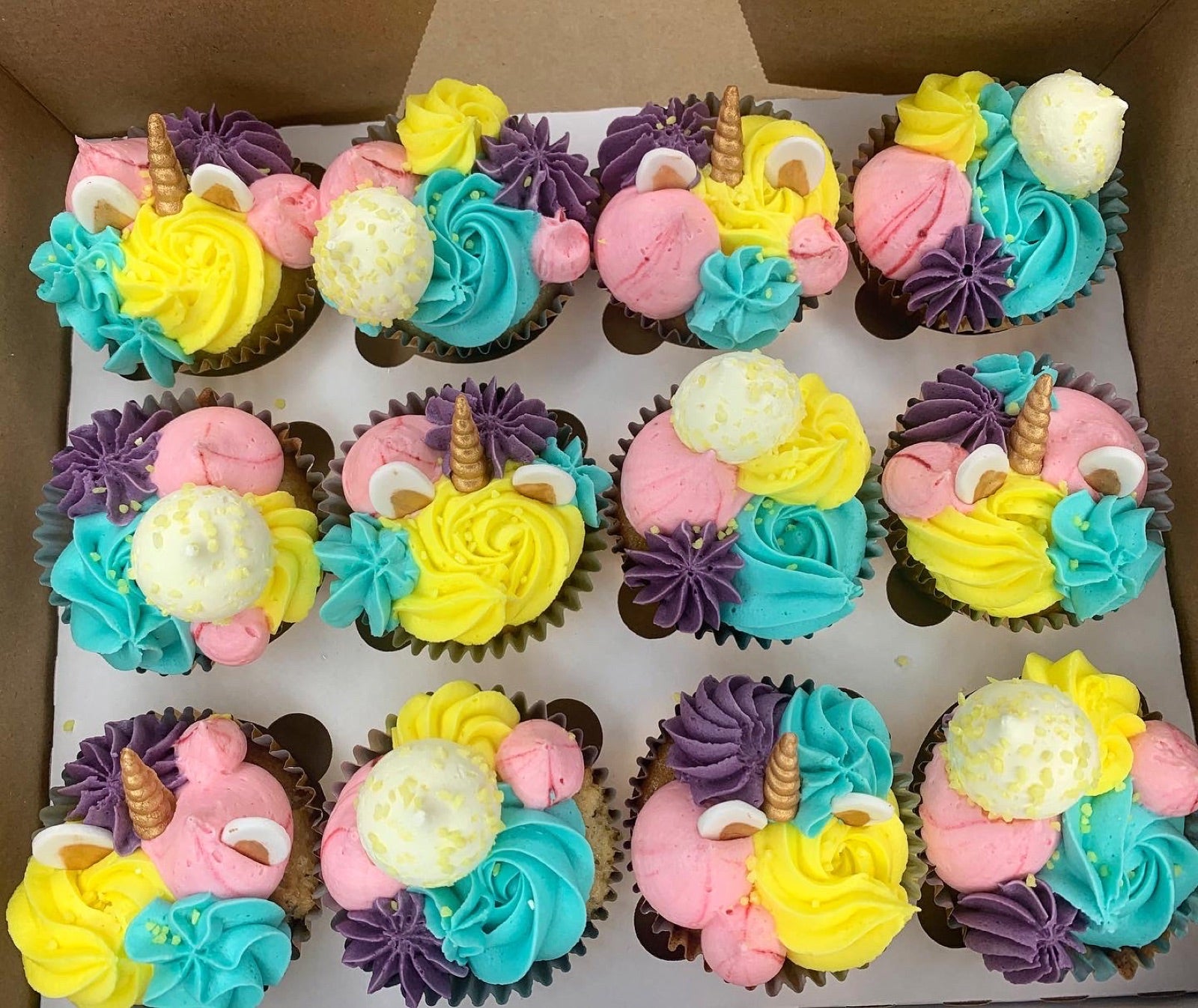 Bright decorated cupcake party box