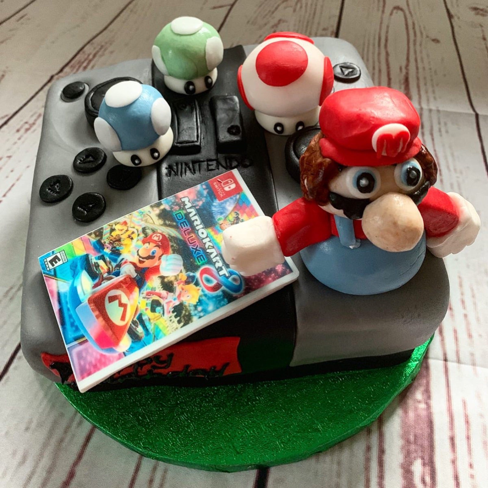 Custom Mario Kart and Nintendo Switch themed celebration cake