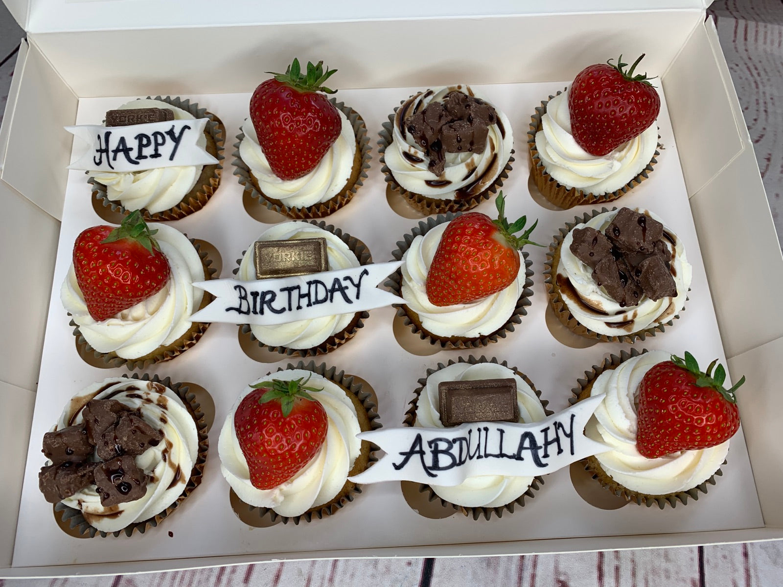 Birthday cupcake box with strawberries and chocolate