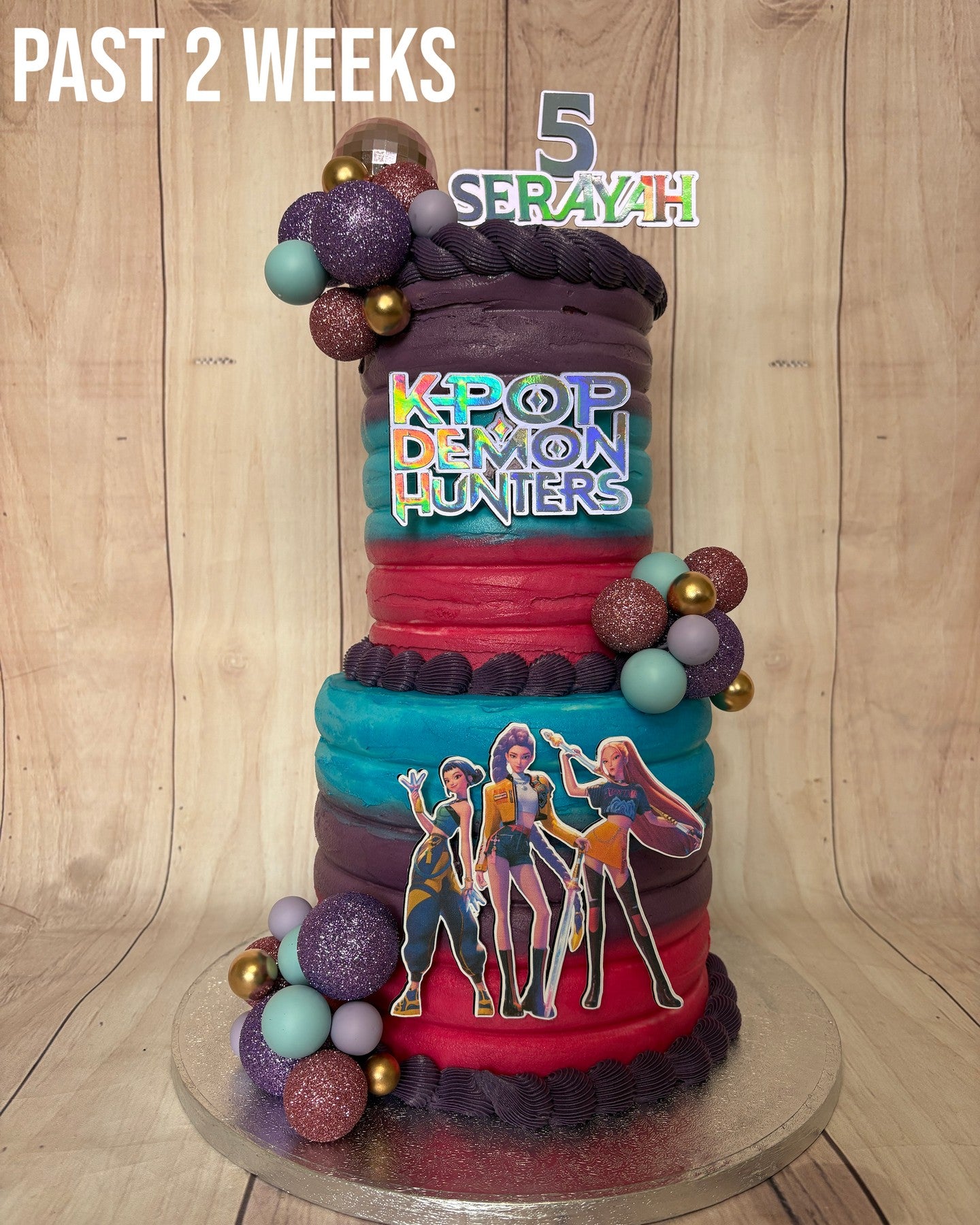 Colourful K-pop themed celebration cake
